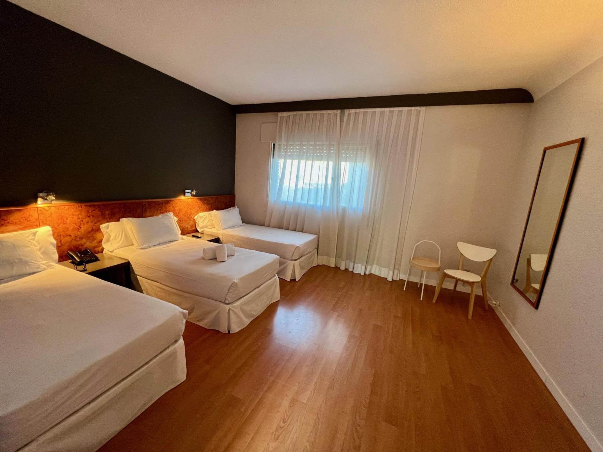 Triple Room - Single Beds
