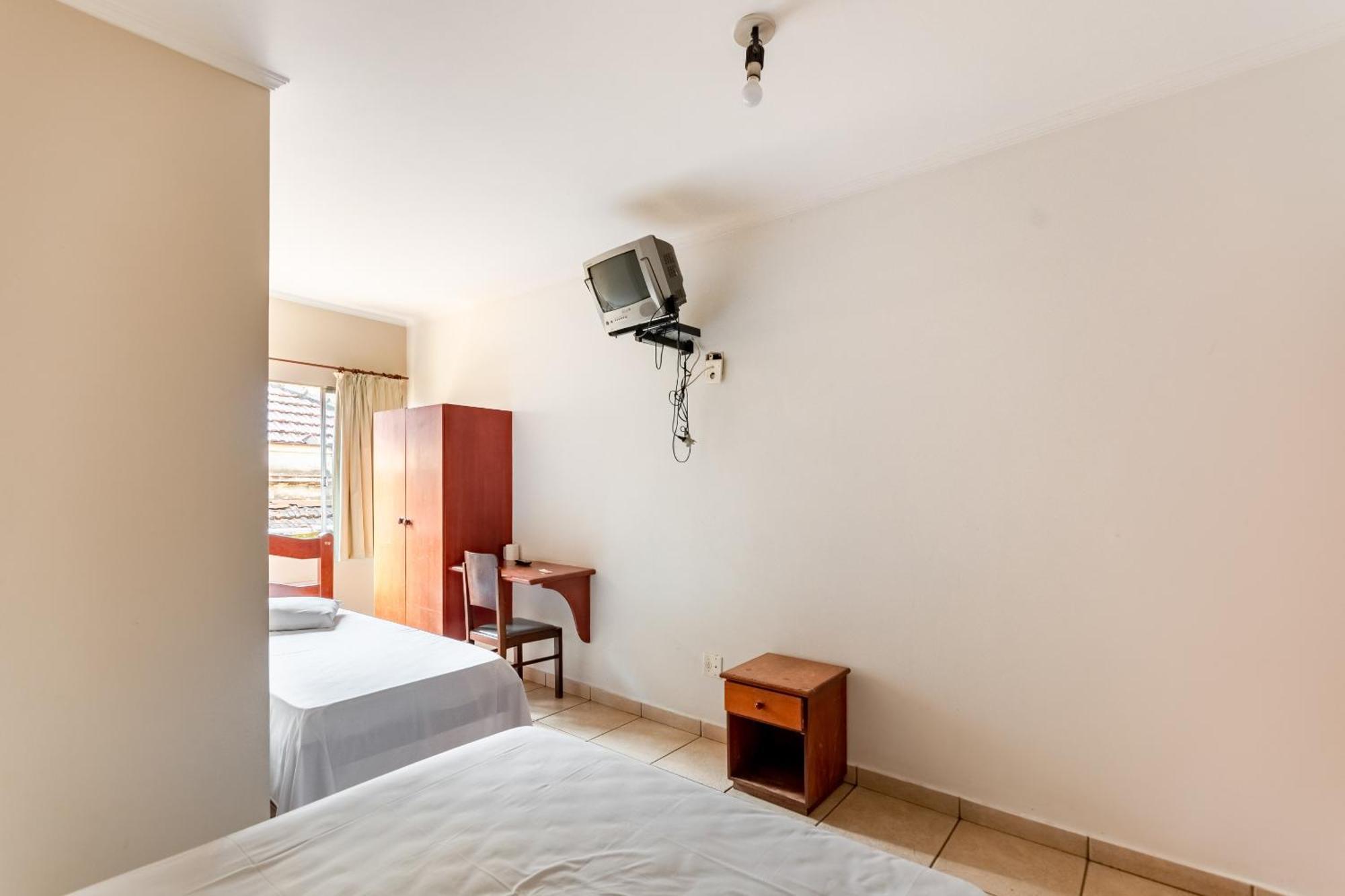 Quadruple Room 1 Double bed 2 Single beds