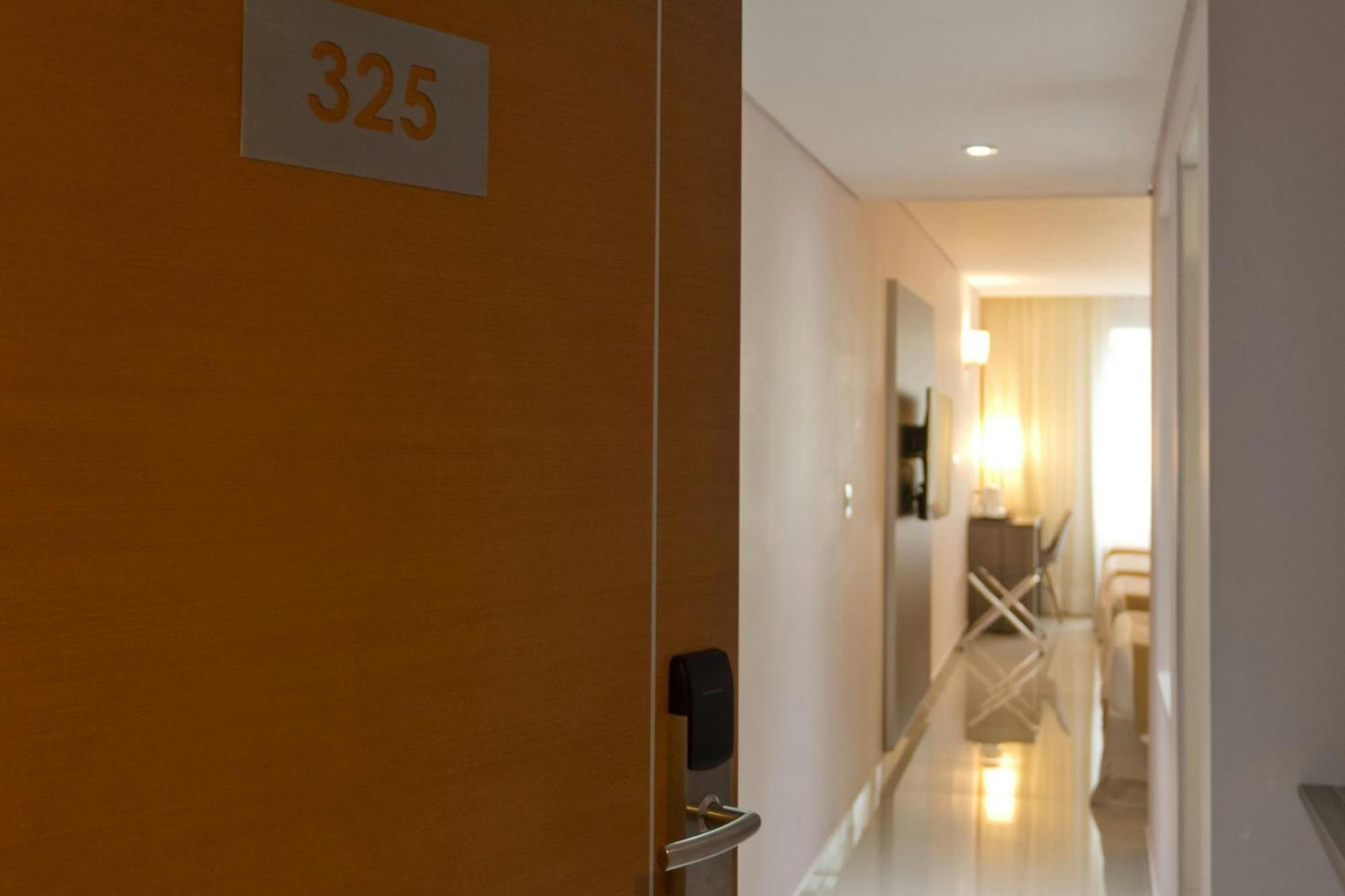 Habitación Doble Superior con 4 camas individuales y vistas limitadas