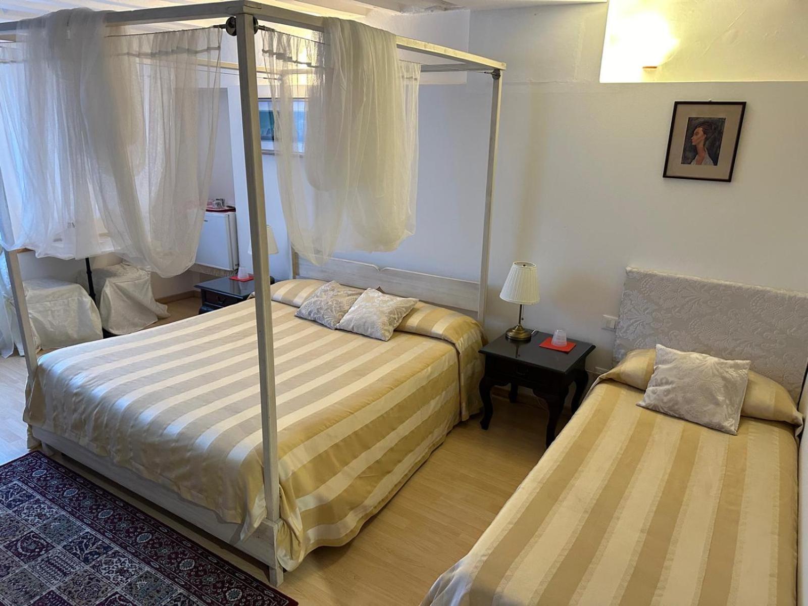 Deluxe Triple Room Garden View