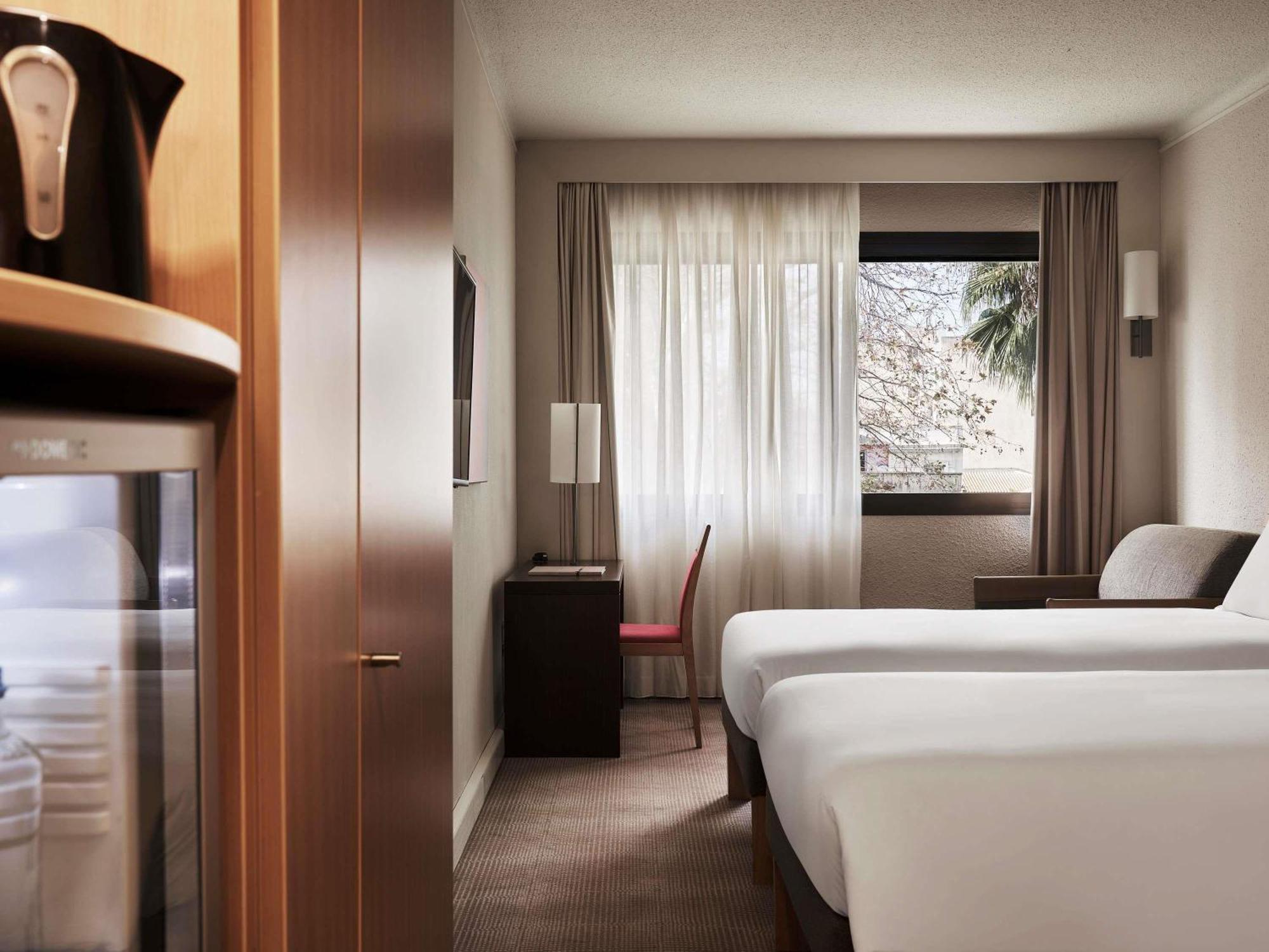 Standard Twin Room 2 single beds 1 single sofa bed