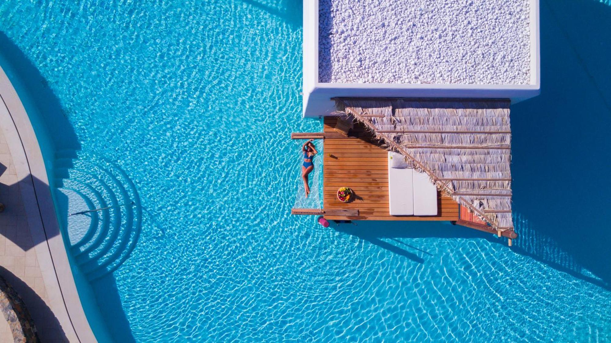 Bungalow con Piscina in Comune