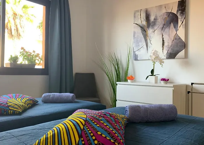 Bedroom With Shared Bathroom And Swimming Pool
