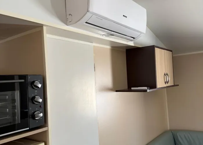 Apartamento con piscina y jardín