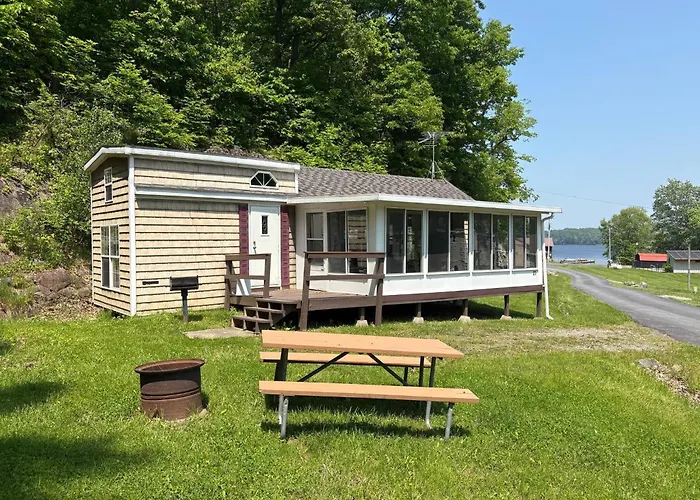 Classic Camper On Black Lake