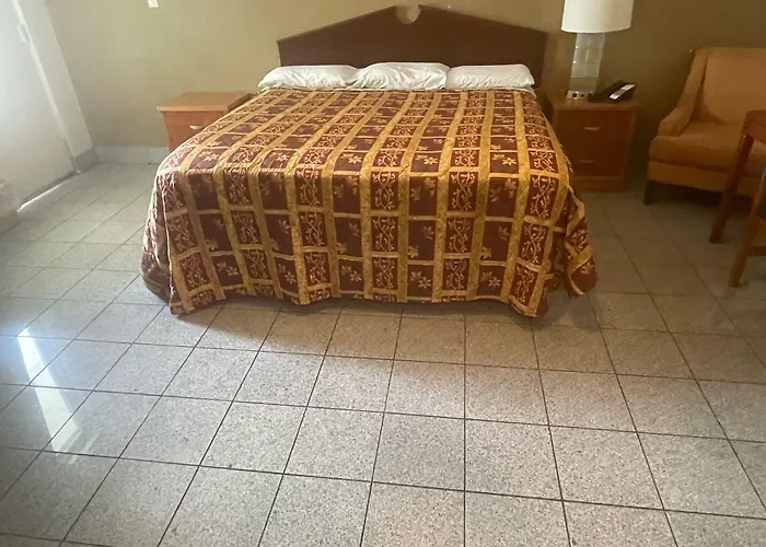 Budgetel Inn And Suites - Louisville