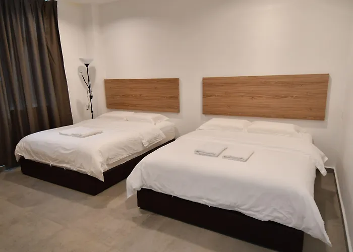Capital O 90615 The Bed Hotel