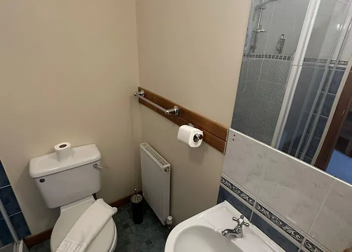 Oyo Mackay'S Travel Lodge Hotel