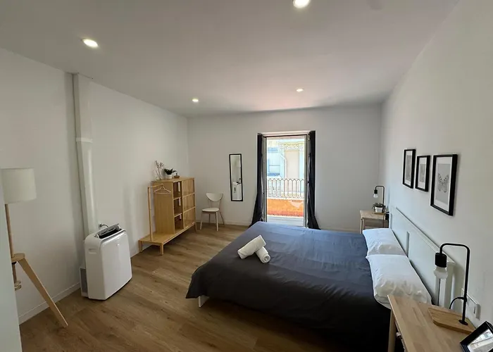Suites Larios Rooms