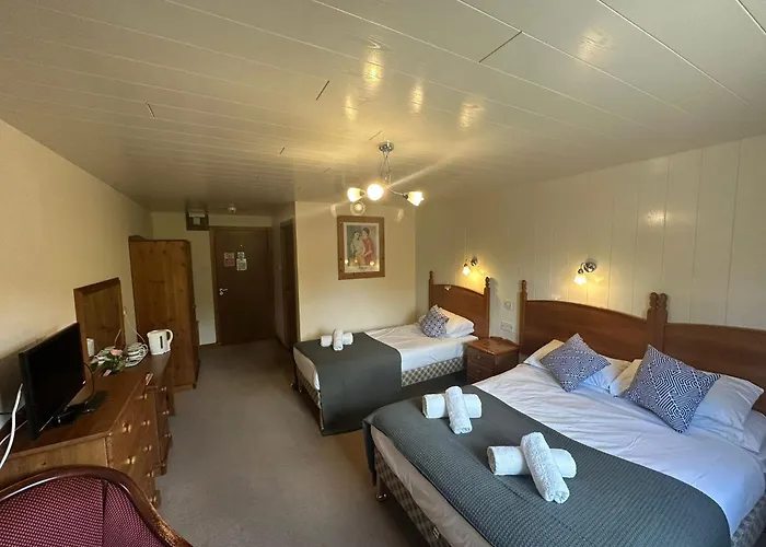 Oyo Mackay'S Travel Lodge Hotel