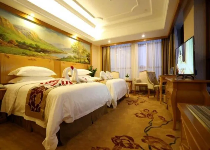 Vienna International Hotel Meizhou Spindle Bridge Branch
