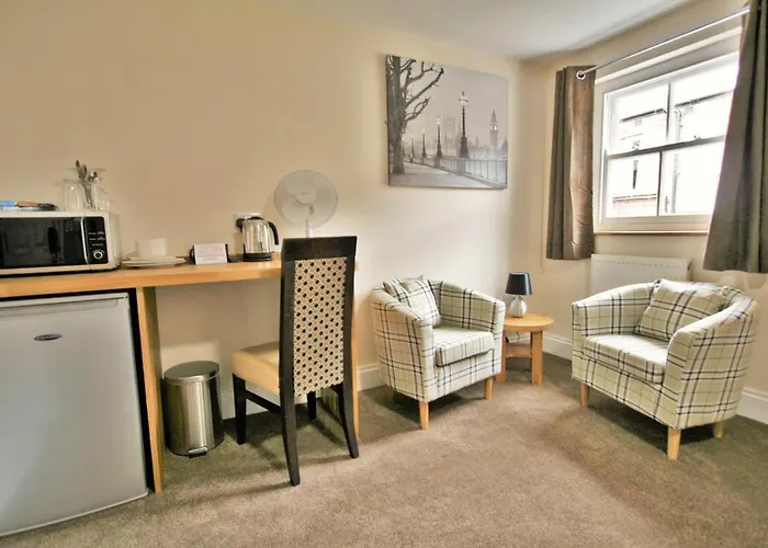 New County Hotel & Serviced Apartments By Roomsbooked